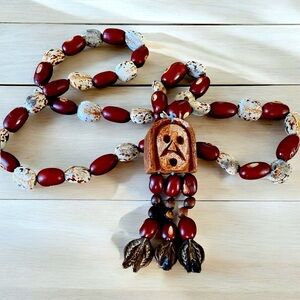 Hand made tribal necklace, carved from seeds and beans, one damaged bean, unique